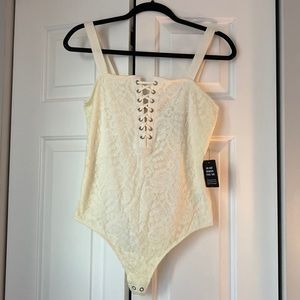 NWT Express white lace thong bodysuit. Size medium.